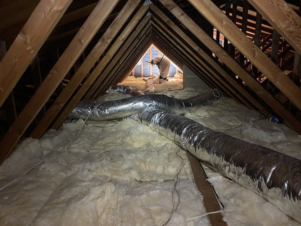 Attic space inspected before new insulation by TX Builder